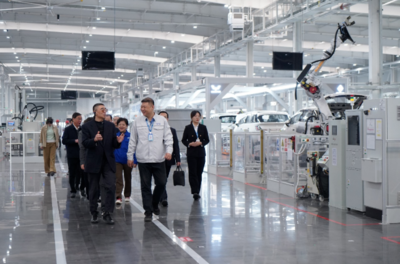 徐念沙会长一行赴上汽通用五菱调研广告设计工作